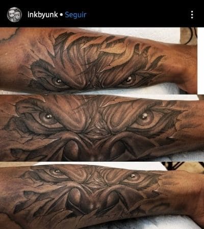 Olhos em realismo no antebraço.