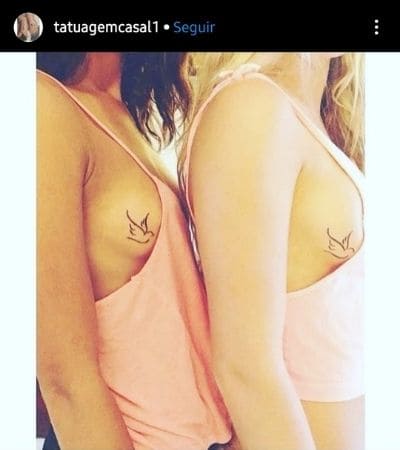Tatuagem para casal com o símbolo de pássaros.